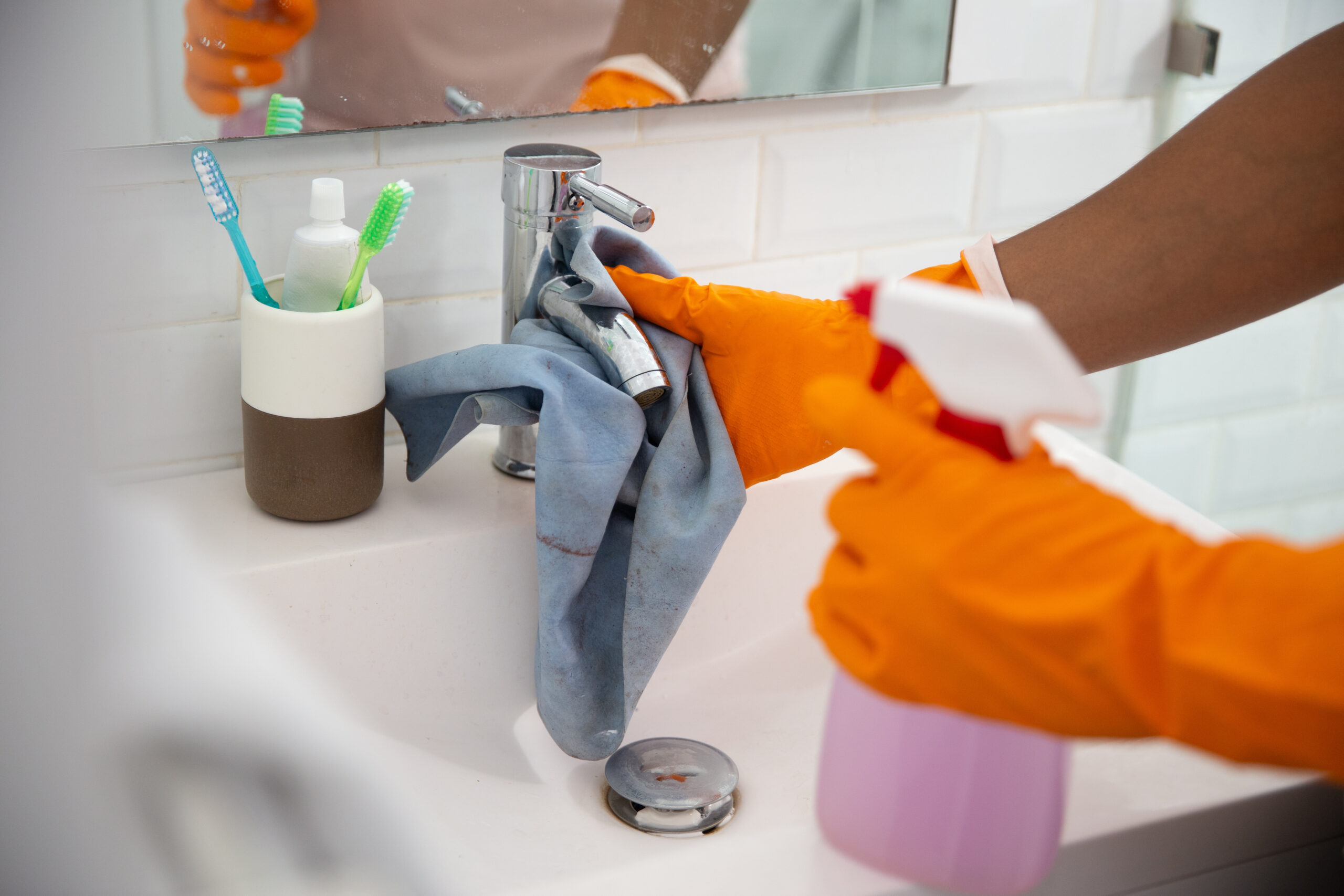 and cleaning the wash basin and tap